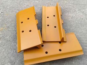 Track Shoes and Pads